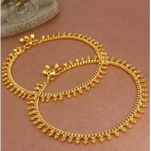 Gold-plated anklets over a copper base